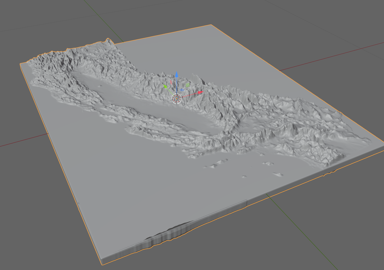3D viewport in Blender showing a topo-displaced mesh that looks like California